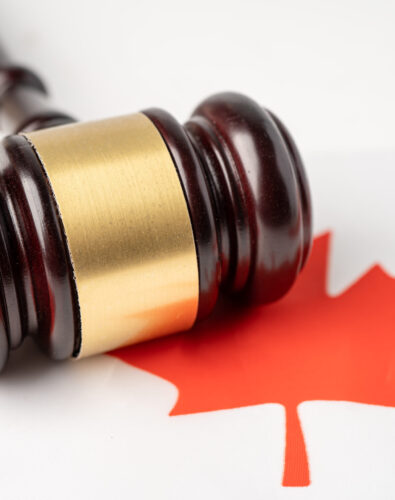 Canada flag on dollar banknotes; business and finance concept. flag country with gavel for judge lawyer. Law and justice court concept.